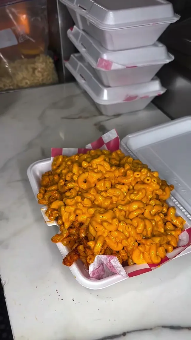 Cheesy Chick loaded fries with cheesy mac, fried chicken and Wifey sauce