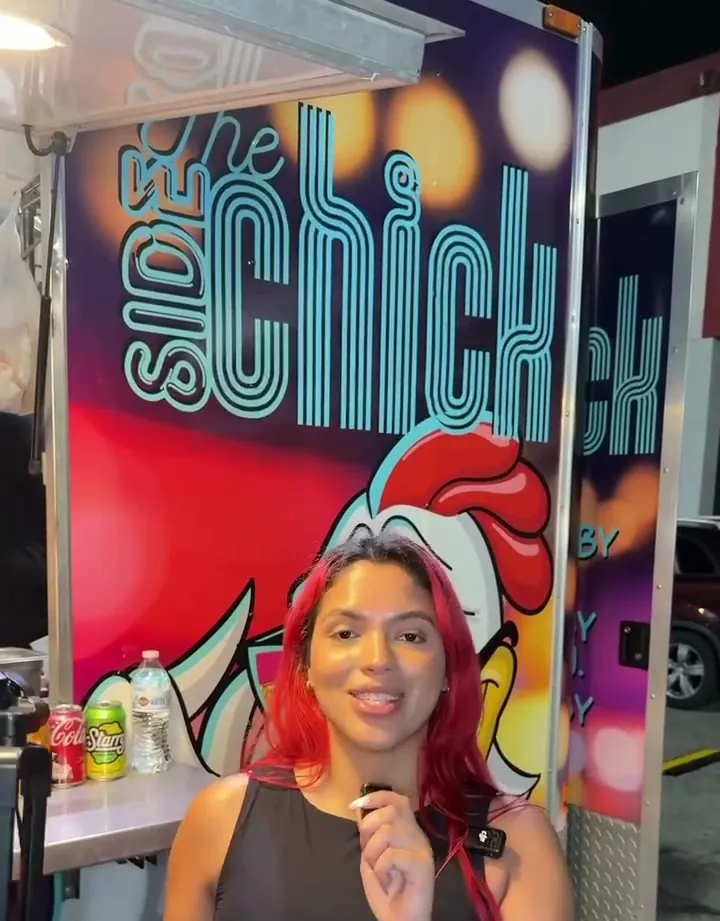 The Side Chick truck with its rooster mural and neon signage